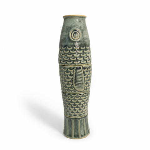 Four ceramic cups stacked to form a koi fish