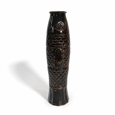 Four ceramic cups stacked to form a koi fish
