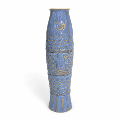 Four ceramic cups stacked to form a koi fish